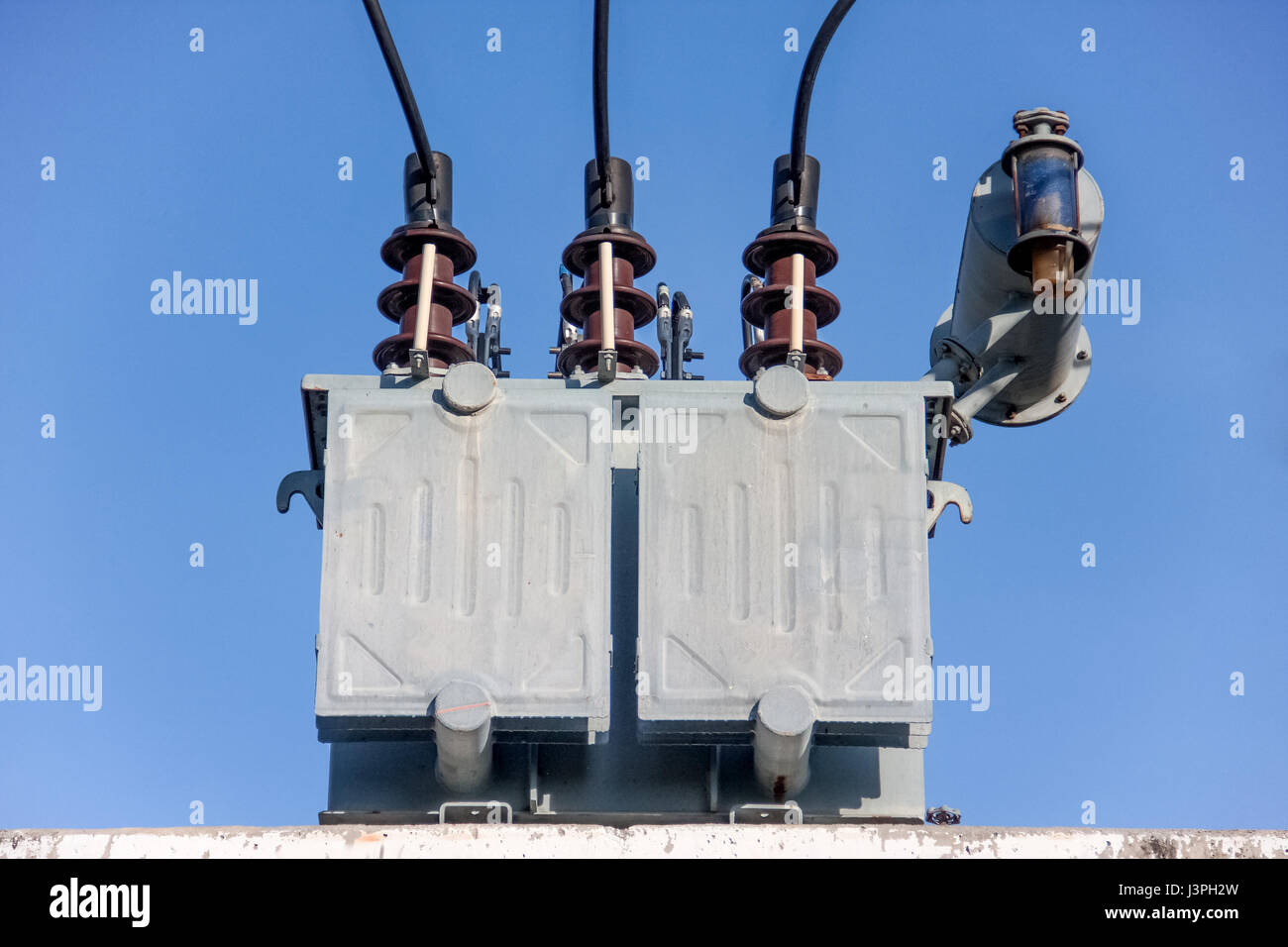 gray transformer on substations with blue sky Stock Photo Alamy