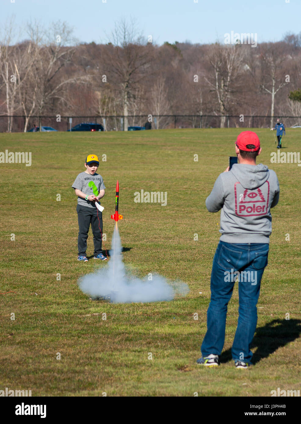 Boy launching a model rocket at Millennium Park, Boston Stock Photo Alamy