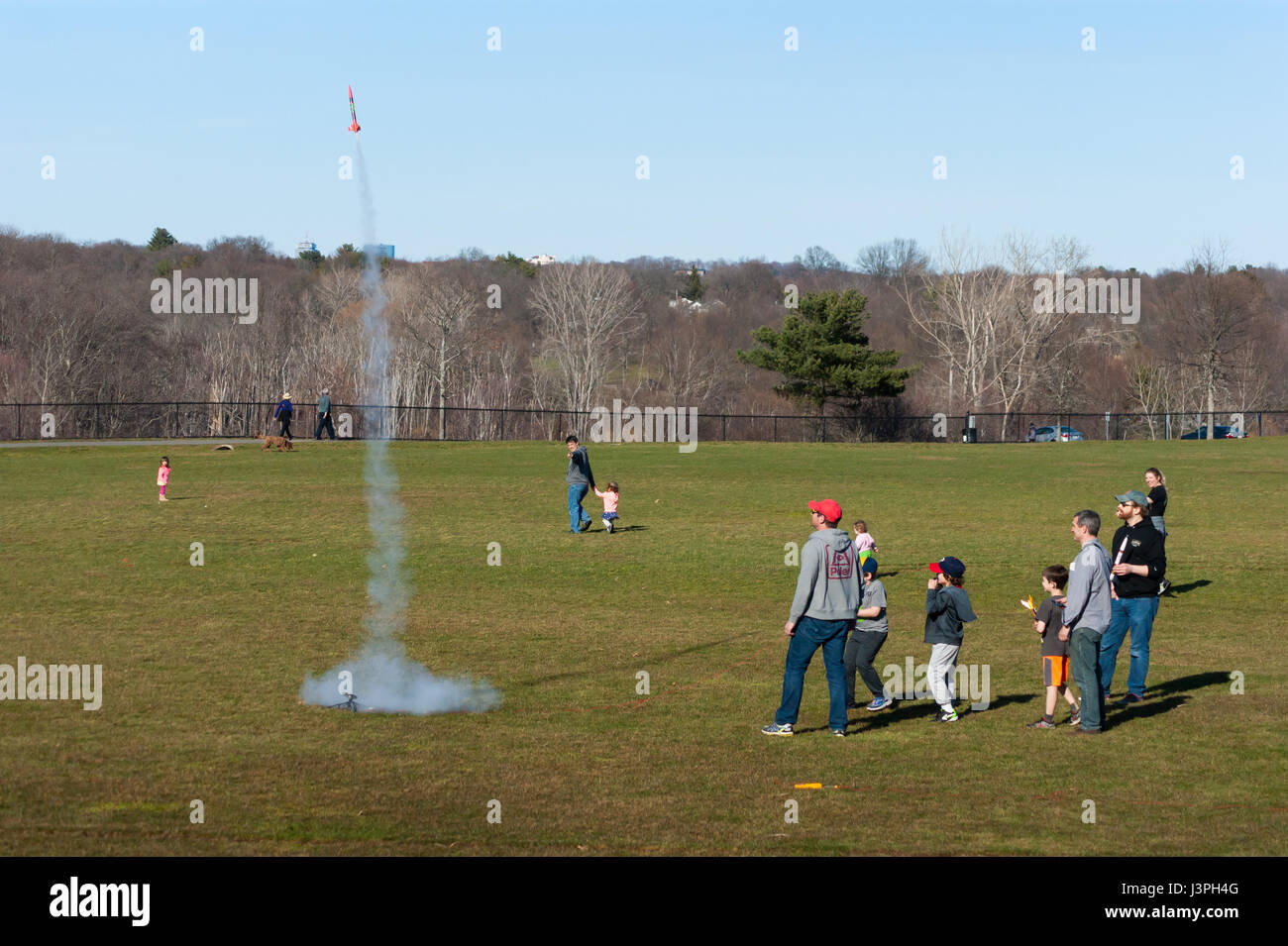 Crowd watching a model rocket launching at Millennium Park, Boston Stock Photo Alamy