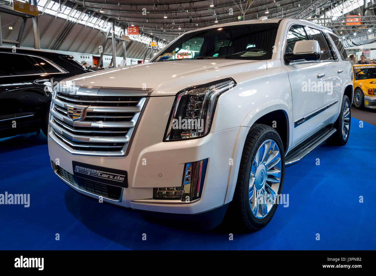 STUTTGART, GERMANY - MARCH 03, 2017: Full-size luxury SUV Cadillac Escalade Platinum, 2017. Europe's greatest classic car exhibition 'RETRO CLASSICS' Stock Photo