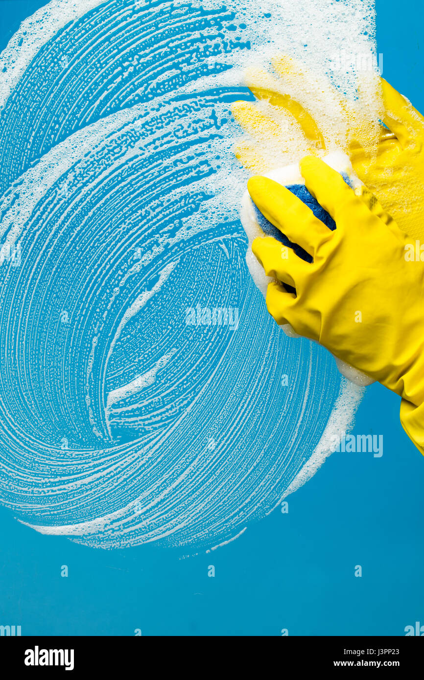 Man in yellow rubber gloves Stock Photo - Alamy