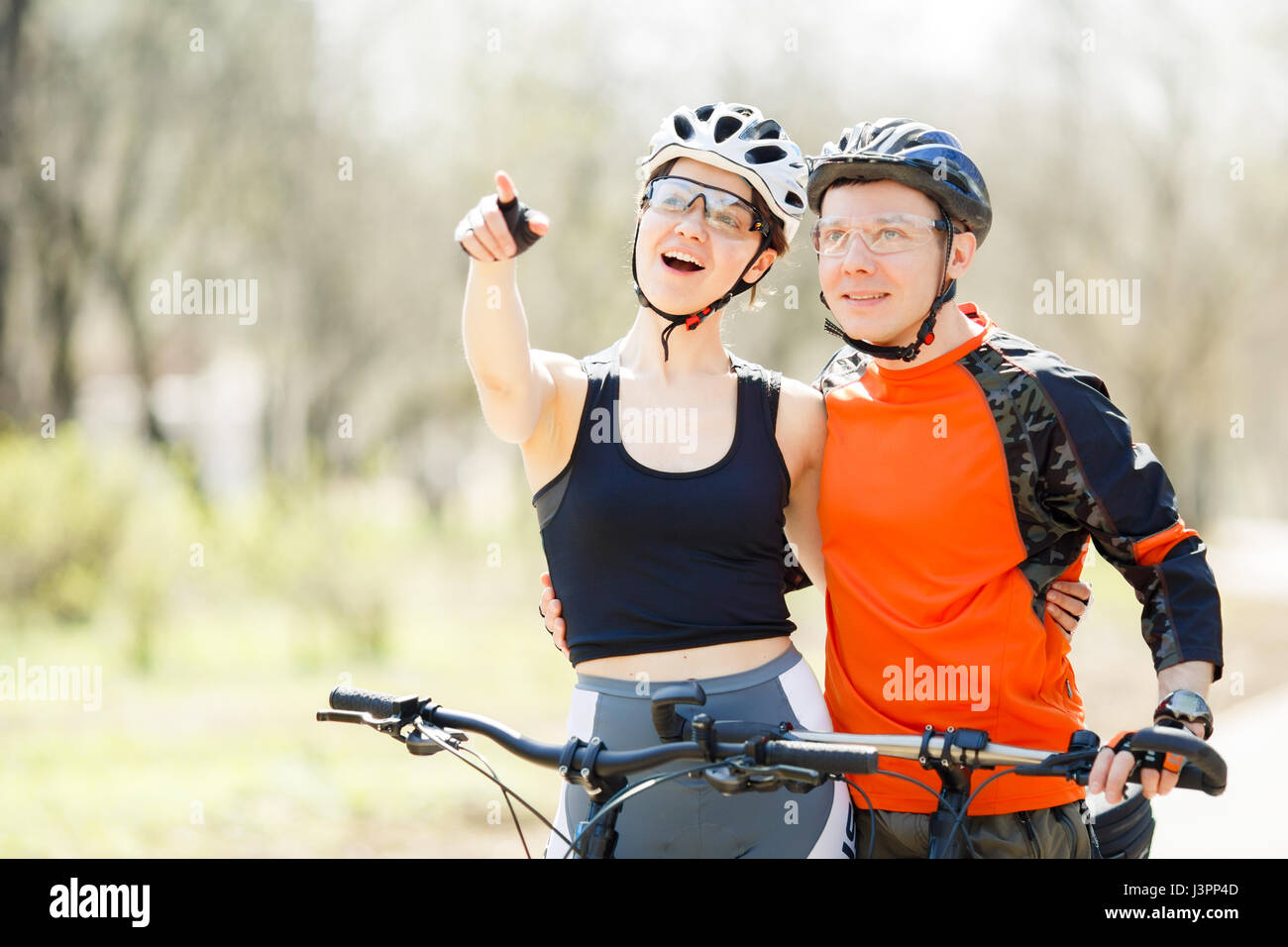 Happy young athletes in helmets Stock Photo Alamy