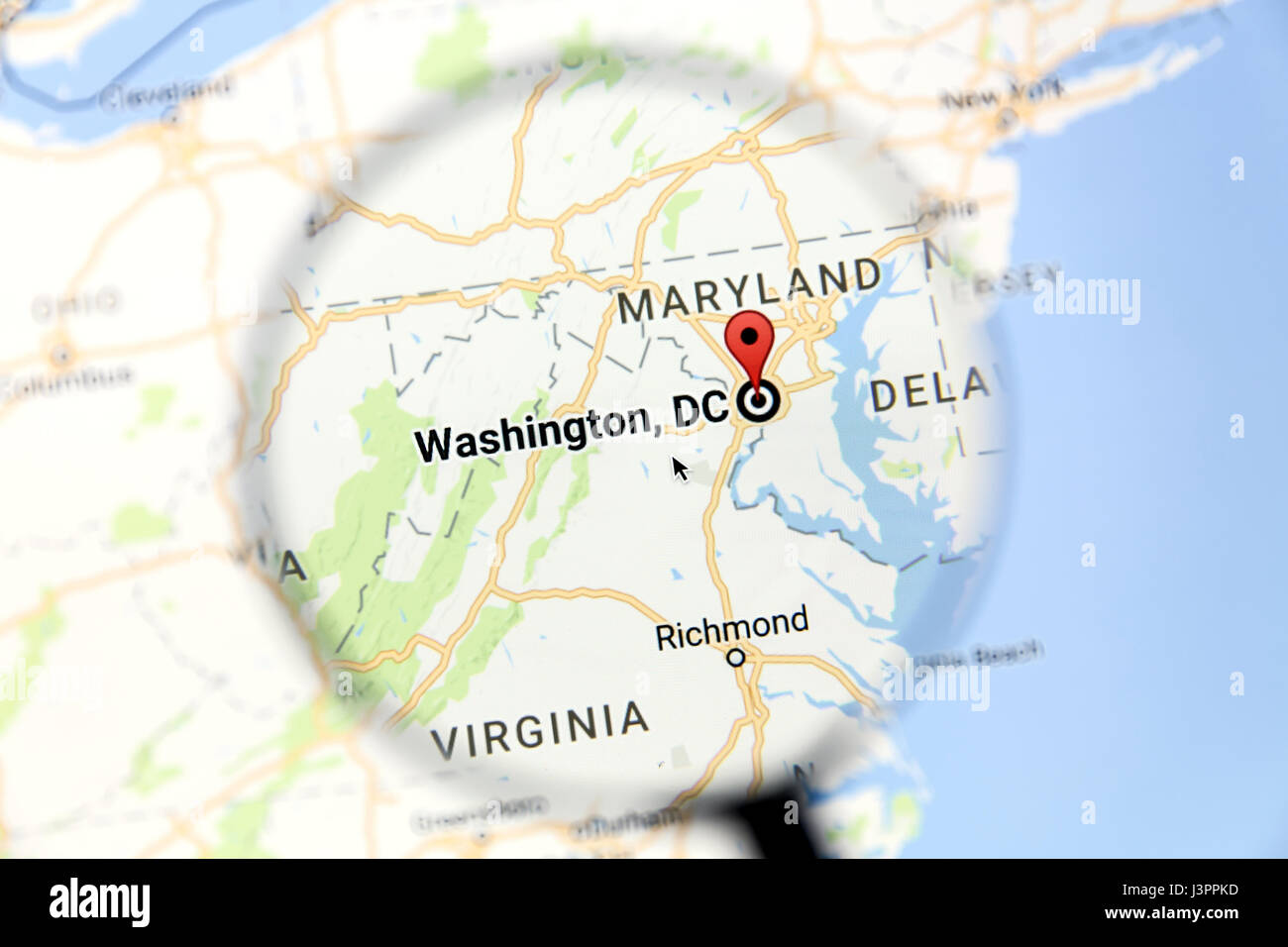 Map of Washington DC on Google Maps under a magnifying glass. Washington DC is the capital city of United States Stock Photo