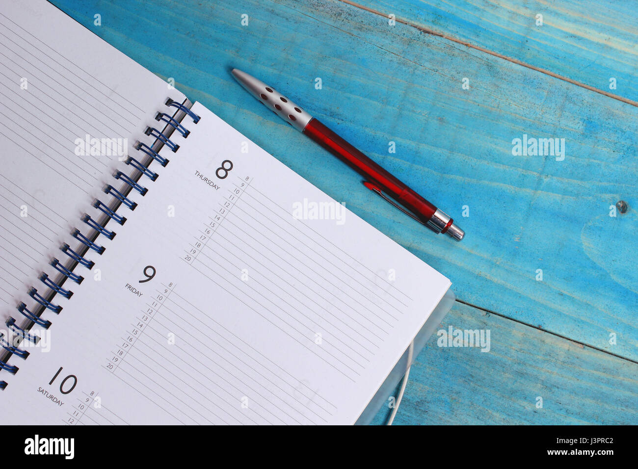 Planner and pen Stock Photo Alamy