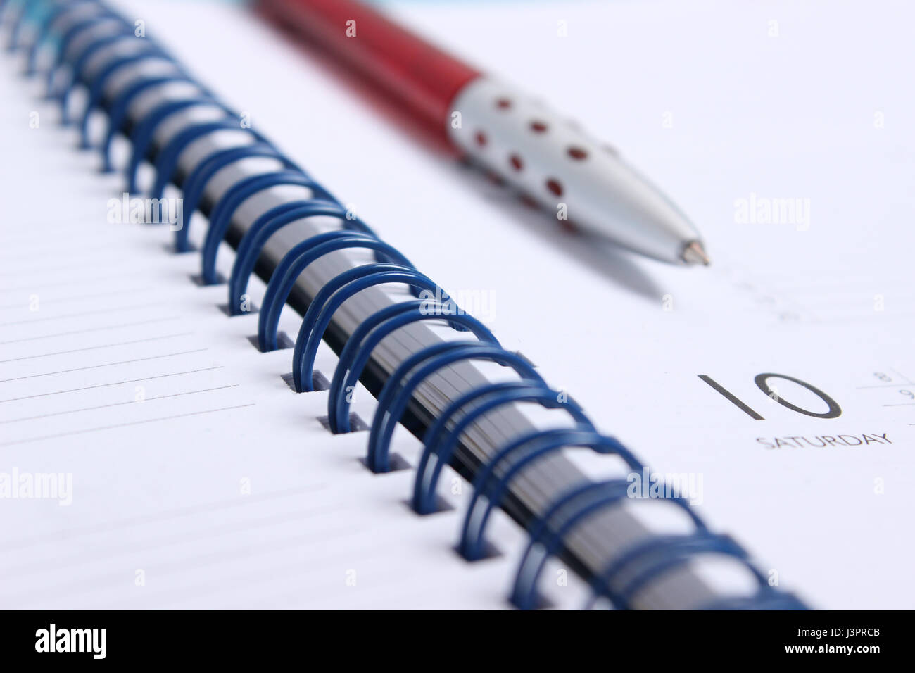Planner and pen Stock Photo Alamy