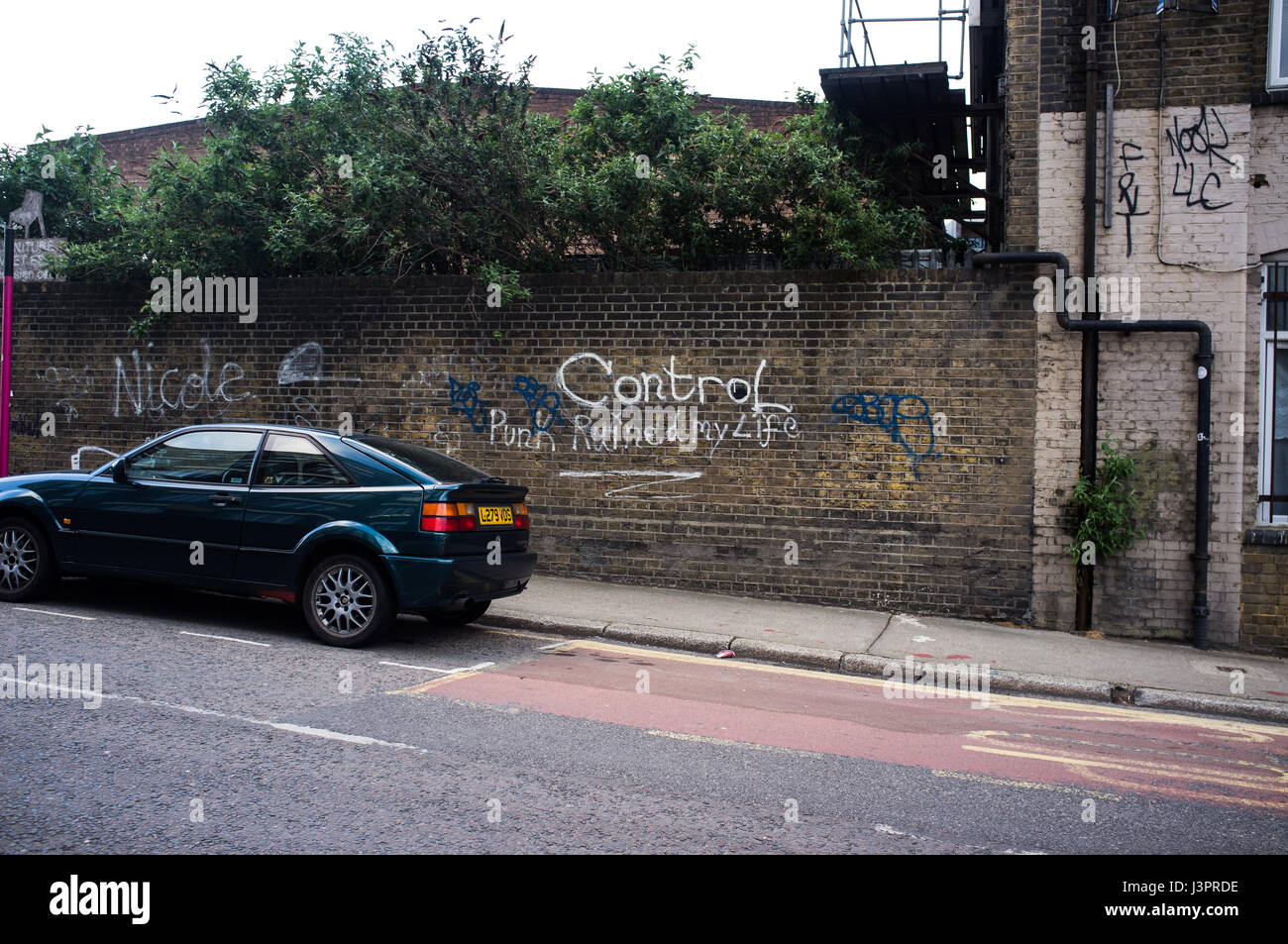 'Control - Punk ruined my life' written on wall in Hackney Wick, London. Stock Photo