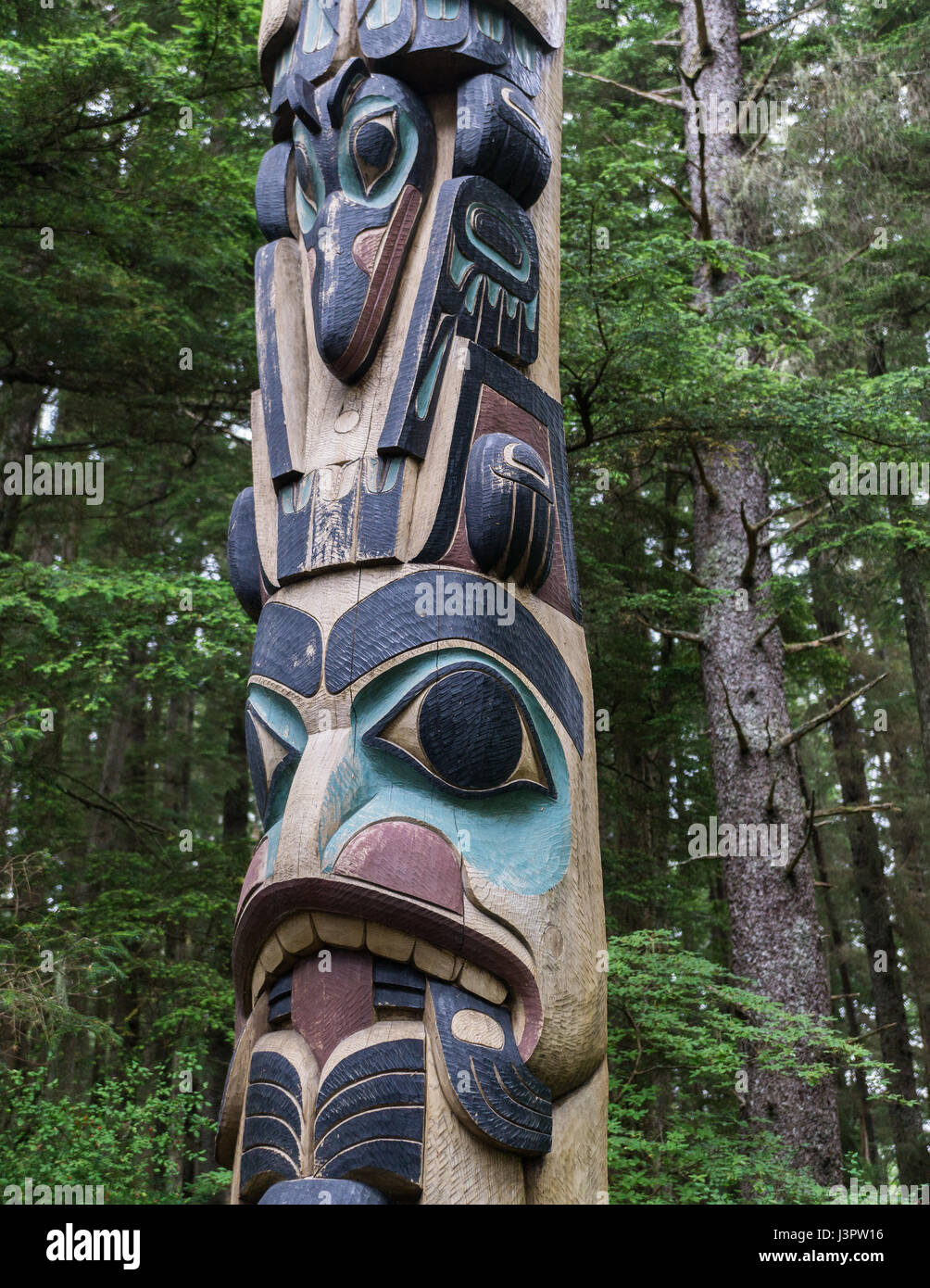 Totem poles in Alaska Stock Photo - Alamy