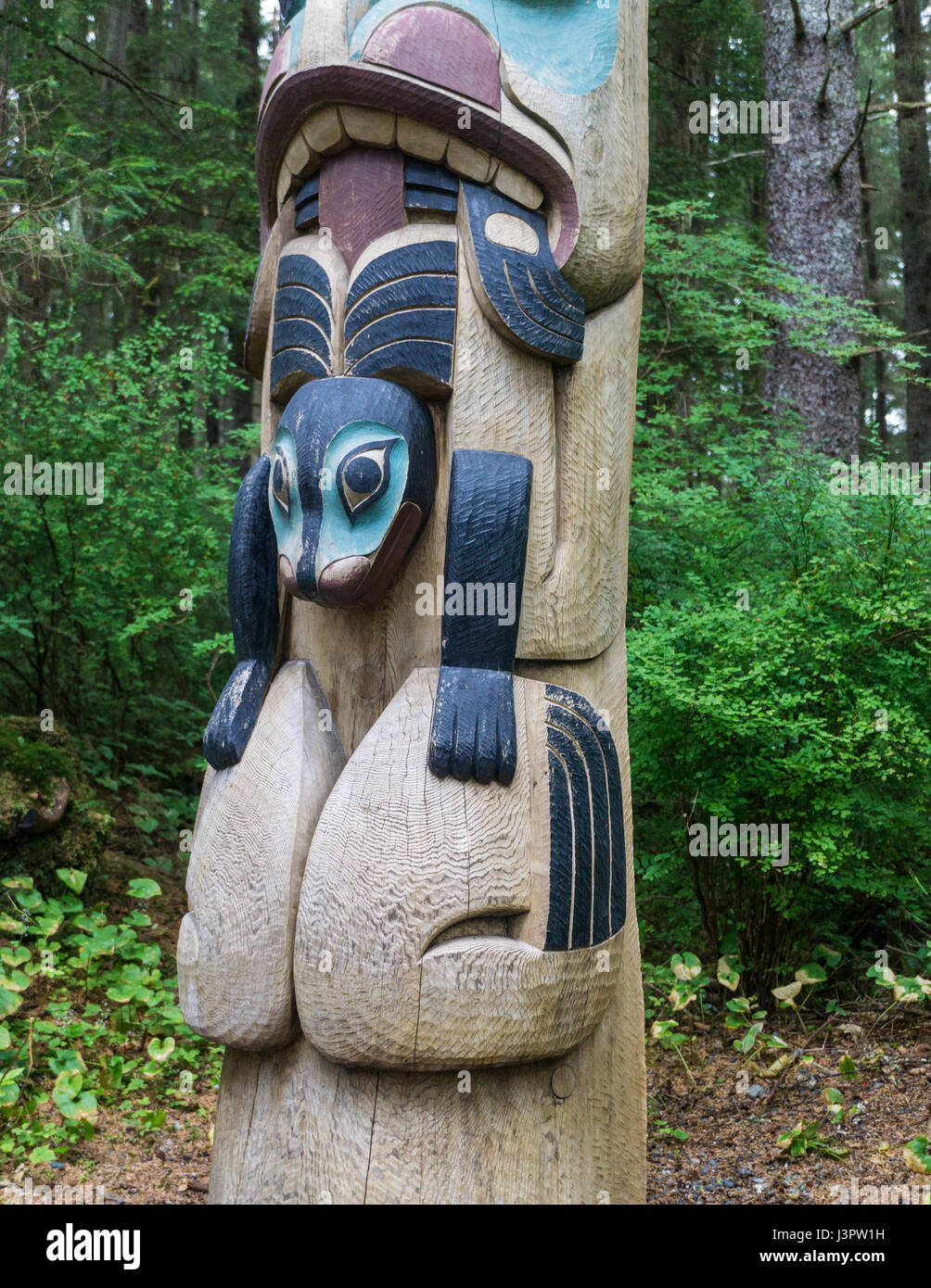Totem poles in Alaska Stock Photo - Alamy