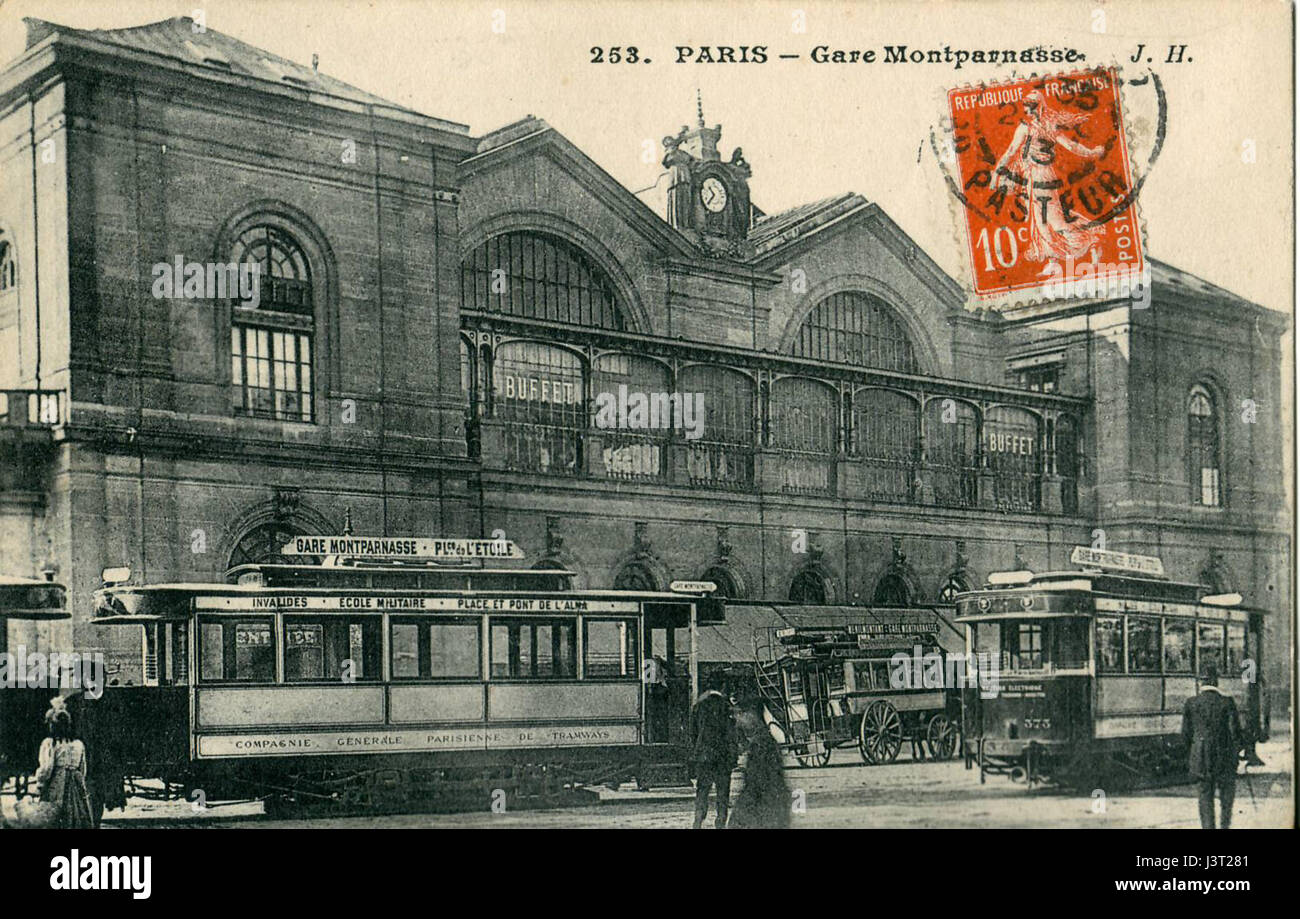 'JH 253 Gare Montparnasse' is a historical photograph showcasing the iconic Gare Montparnasse railway station in Paris. The image captures the station's architecture and its significance in the transportation history of France. Stock Photo