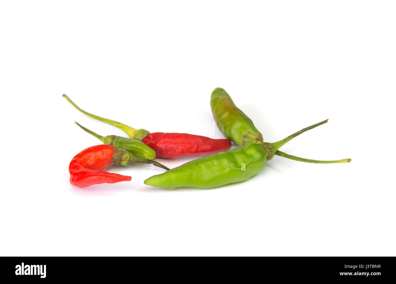 Chili peppers isolated on a white background Stock Photo - Alamy