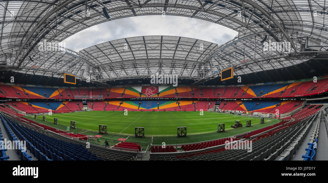 A panoramic image of the inside of the Amsterdam Arena, home of Ajax Amsterdam, in Amsterdam, Netherlands, taken from pitchside Stock Photo