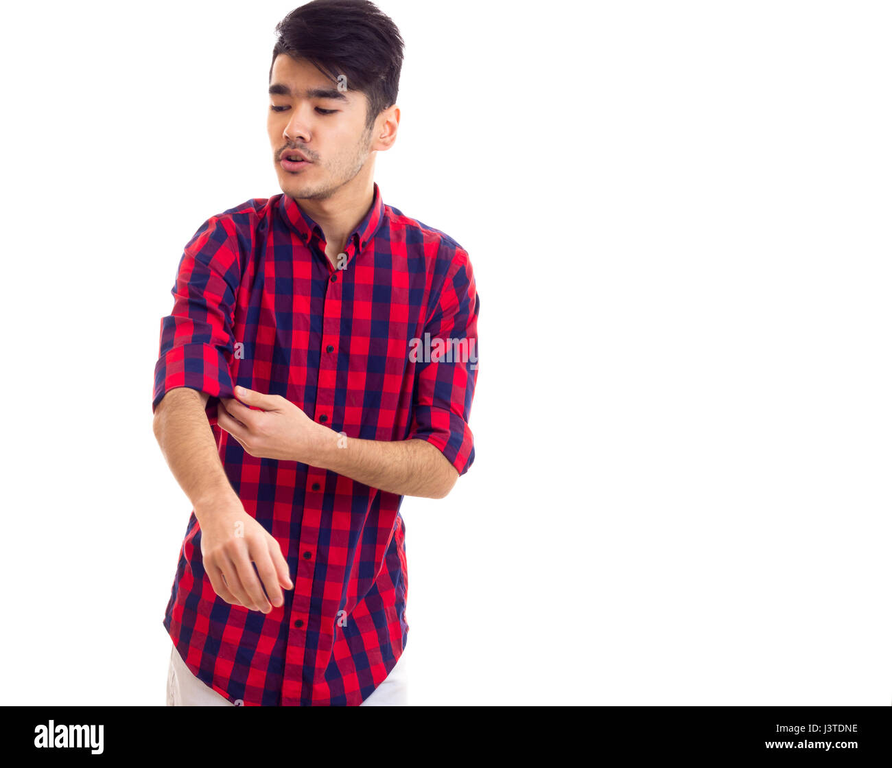 Young man in plaid shirt Stock Photo