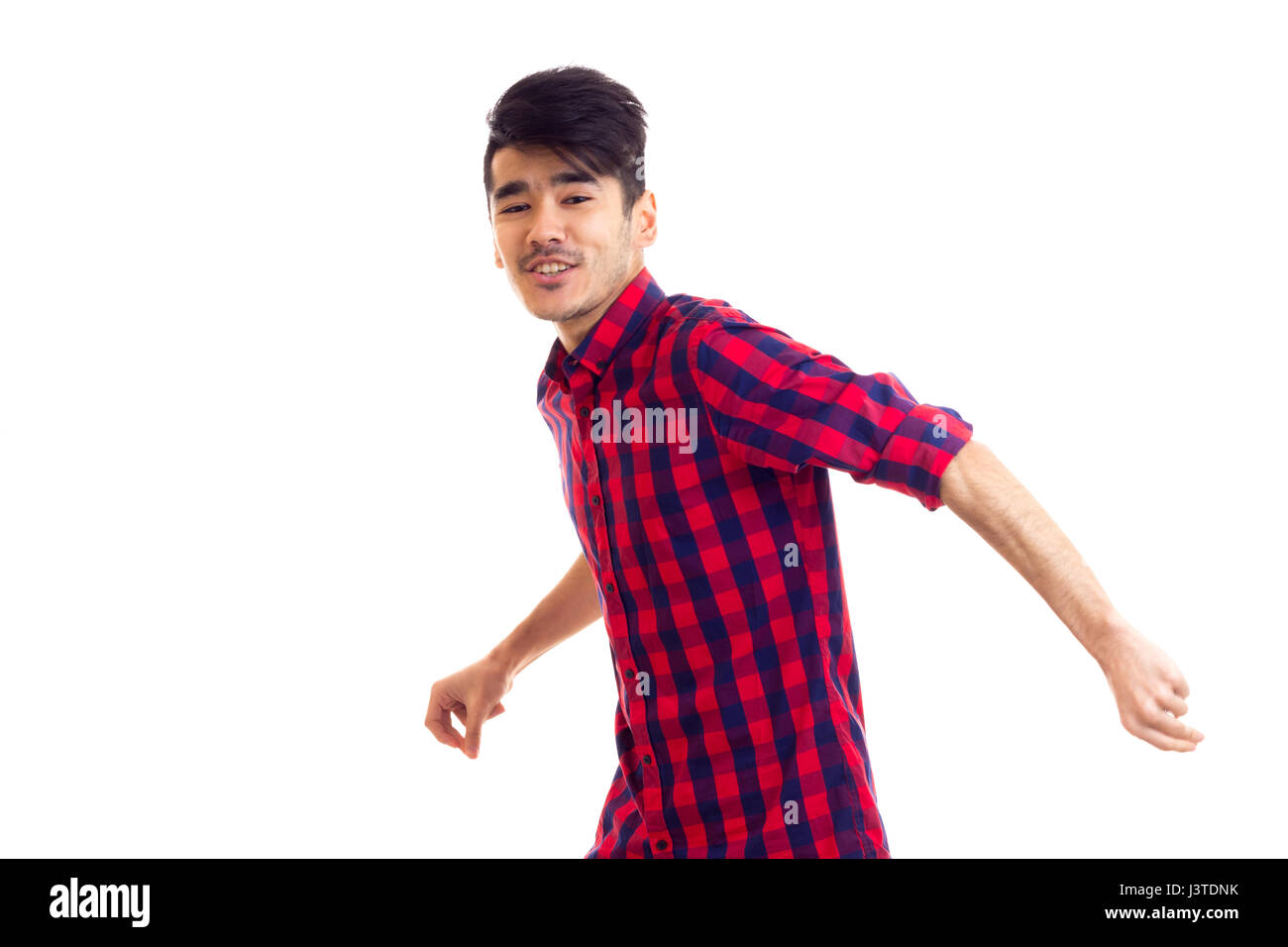 Young man in plaid shirt Stock Photo