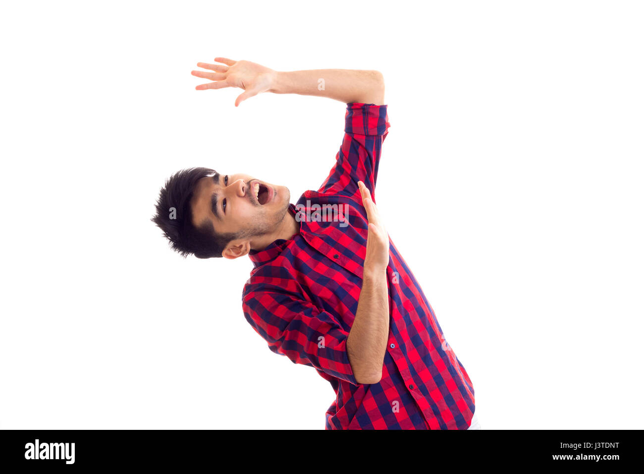 Young man in plaid shirt Stock Photo