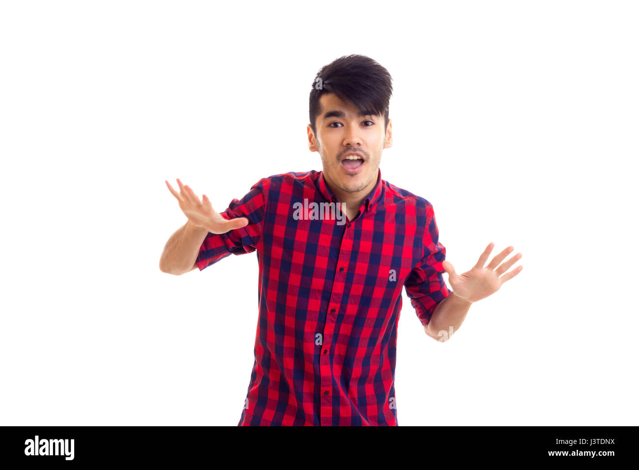 Young man in plaid shirt Stock Photo