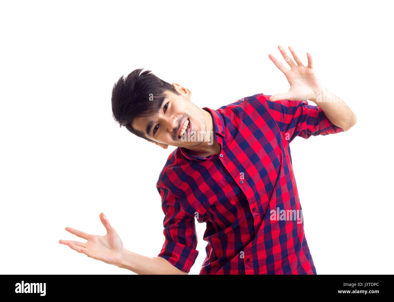 Young man in plaid shirt Stock Photo