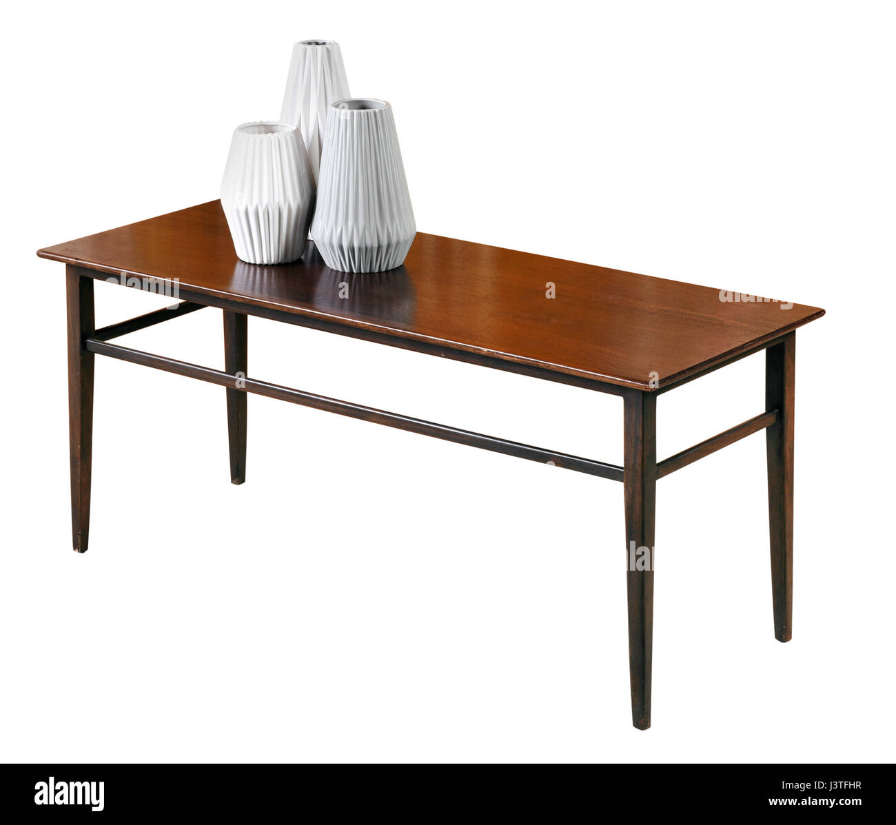 Small rectangular mahogany coffee or side table with three white fluted ceramic vases on top