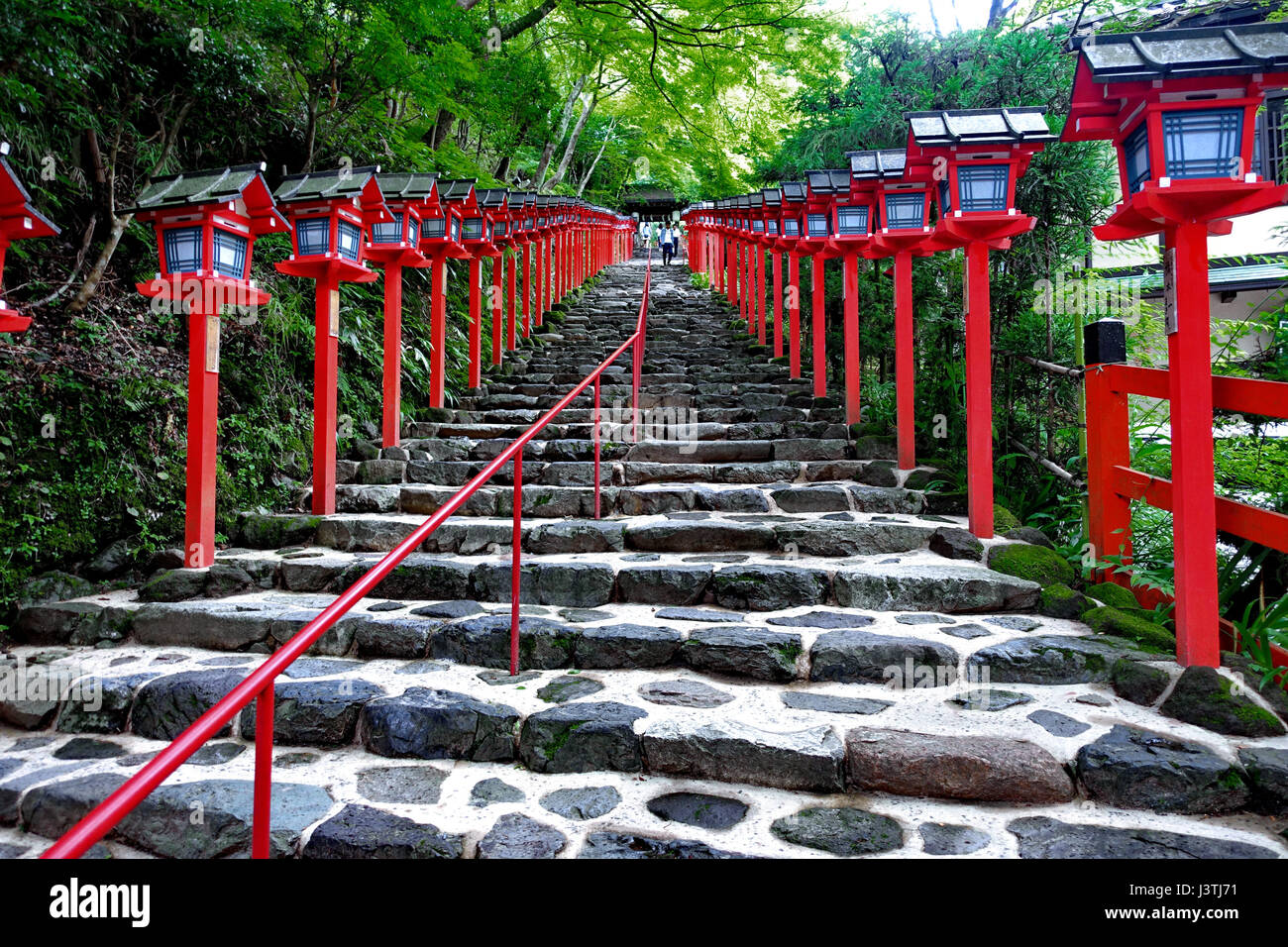 Red Light Poles continued staircase entrance to  Kibune-jinja shrine, Kyoto, Japan. Selective focus. Stock Photo