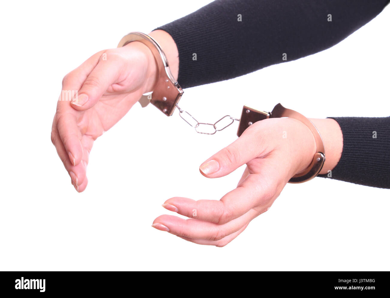 Woman handcuffed hands Stock Photo