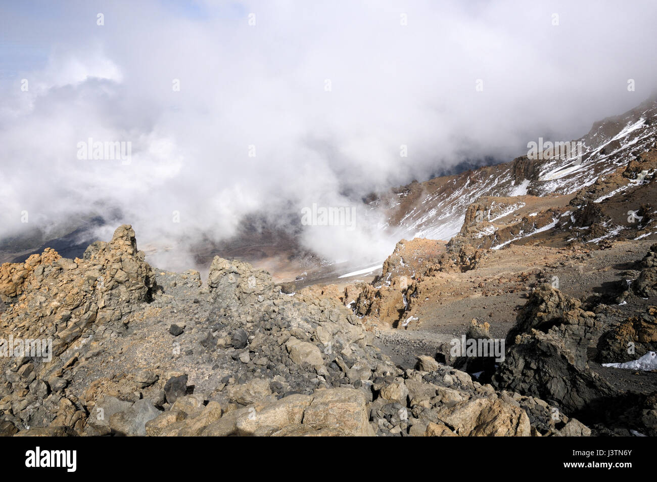 Clouds at the top of the Western Breach, Kilimanjaro National Park, Tanzania Stock Photo