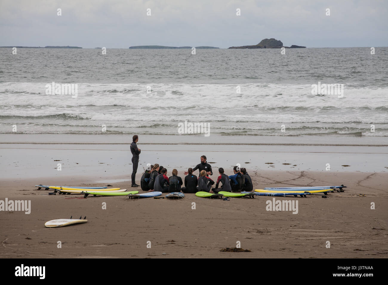 Surfing lessons at Banna Beach in Ireland Stock Photo Alamy