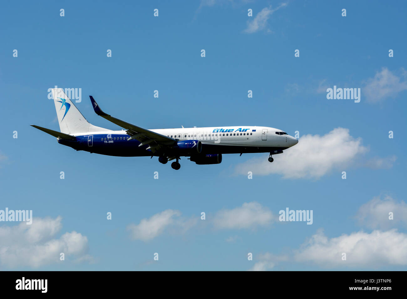 Blue Air Boeing 737 landing at Birmingham Airport, UK Stock Photo
