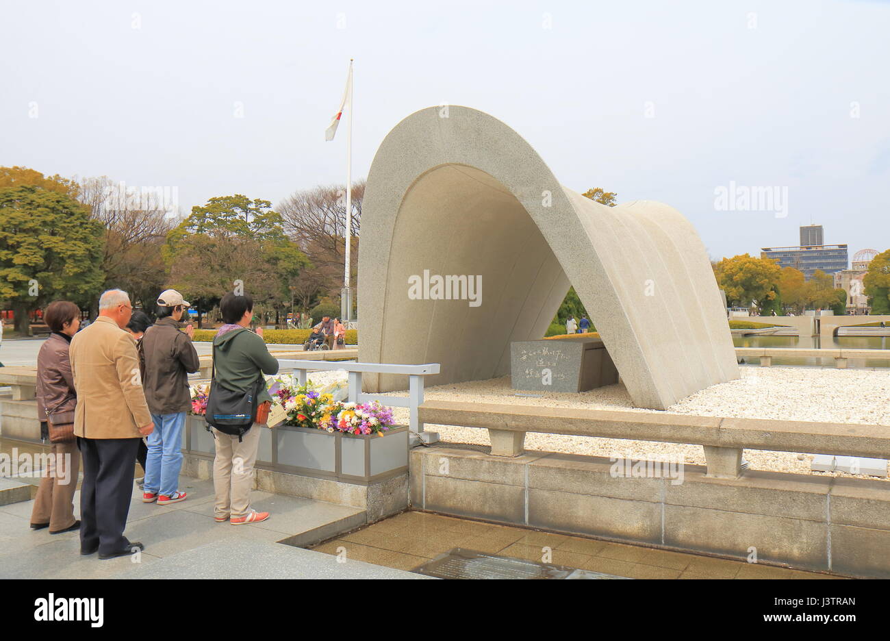 People pray at Hiroshima Peace Memorial Park in Hiroshima Japan. Stock Photo