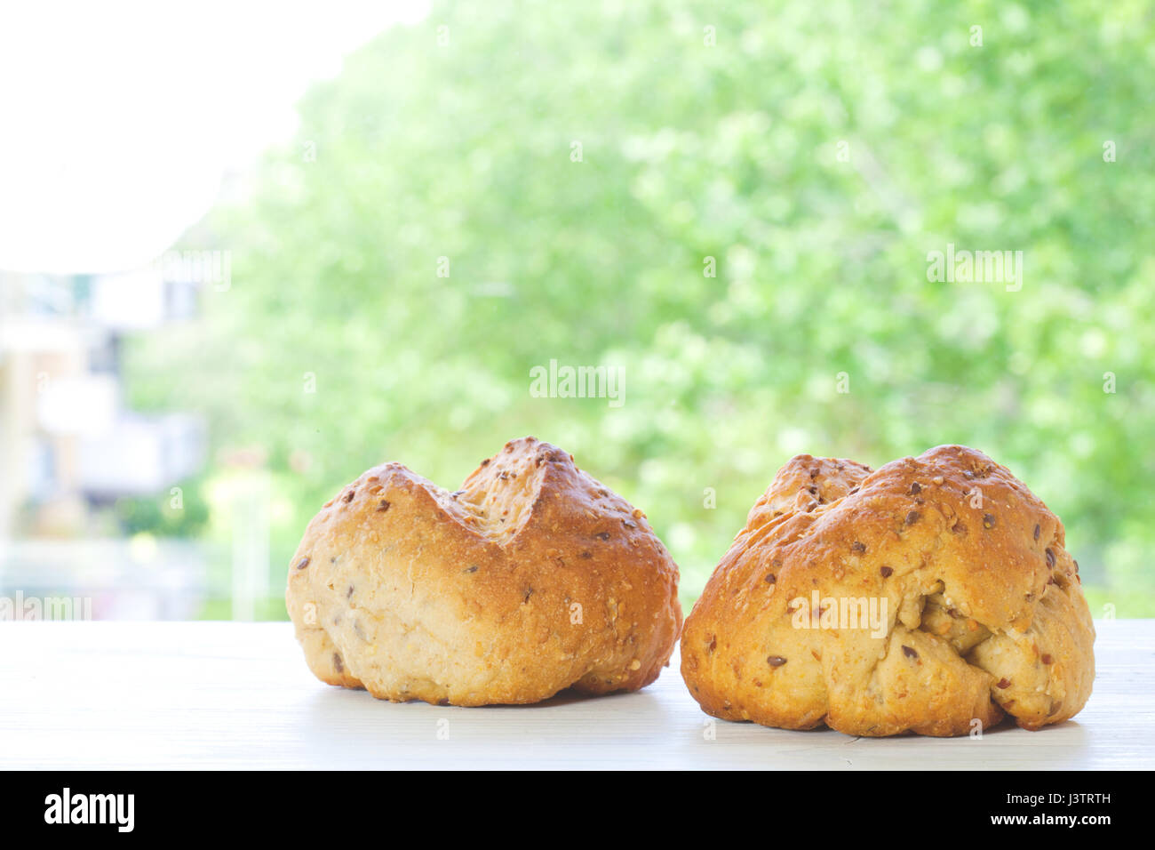 two cereal bread bun with panorama in dof. Stock Photo