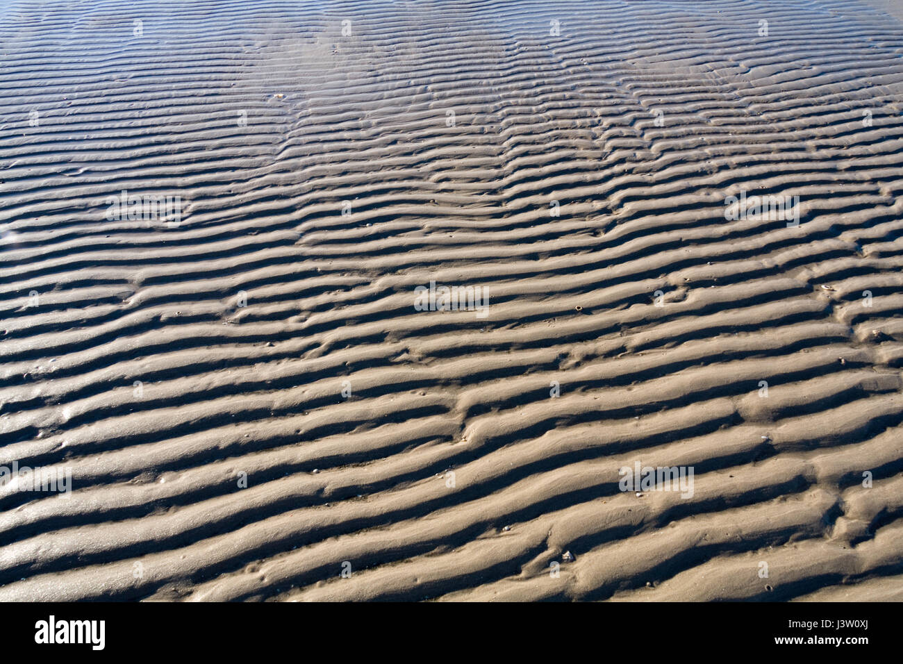 Sand ribs on Cha Am beach, prachuap khiri khan, Thailand Stock Photo