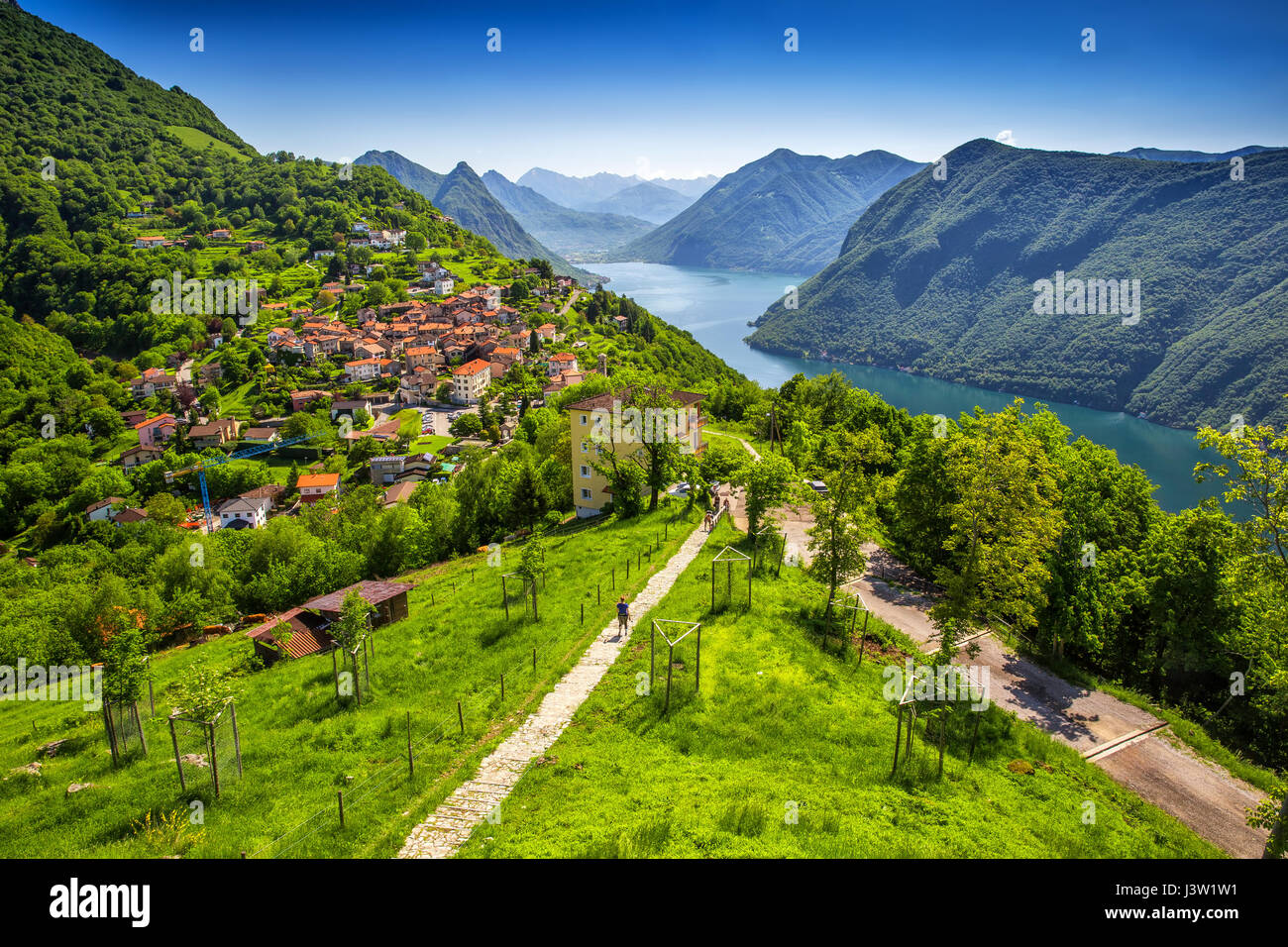 View to Lugano city, Lugano lake and Monte San Salvatore from Monte Bre, Ticino, Switzerland Stock Photo