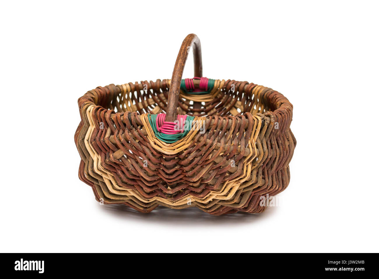 Empty wicker basket isolated on white background Stock Photo - Alamy