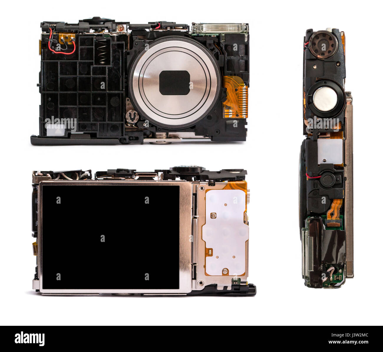 Disassembled digital camera from different angles. Details of the broken camera isolated on white background. Repair of photographic technique. Stock Photo