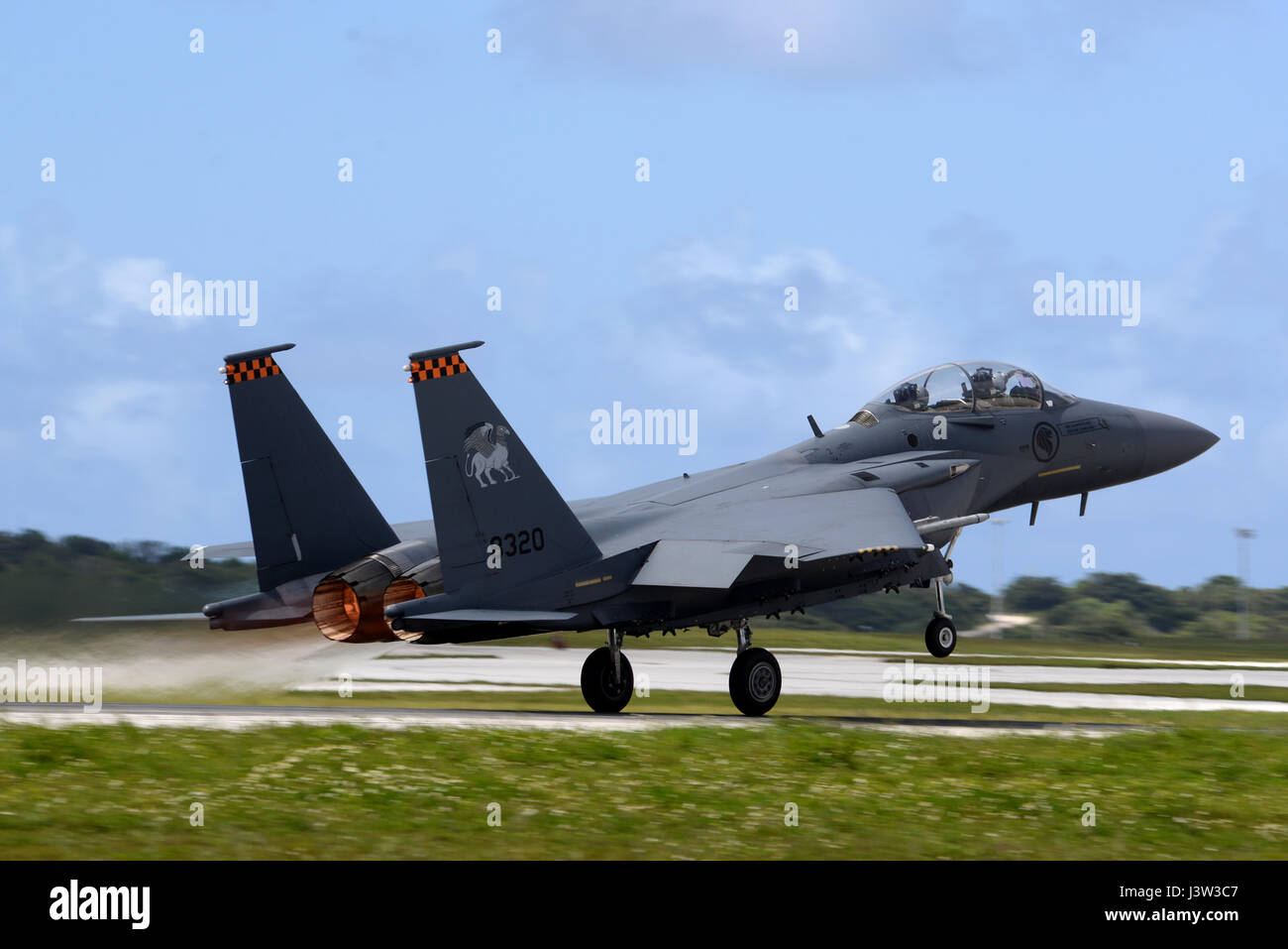 A Republic of Singapore Air Force F-15SG takes-off April 20, 2017, at Andersen Air Force Base, Guam. The RSAF deployed to Andersen AFB in support of Exercise Vigilant Ace to conduct bilateral training for aircrew and maintenance personnel to sharpen their skills and strengthen ties with partners in the Pacific. (U.S. Air Force/Airman 1st Class Gerald R. Willis) Stock Photo