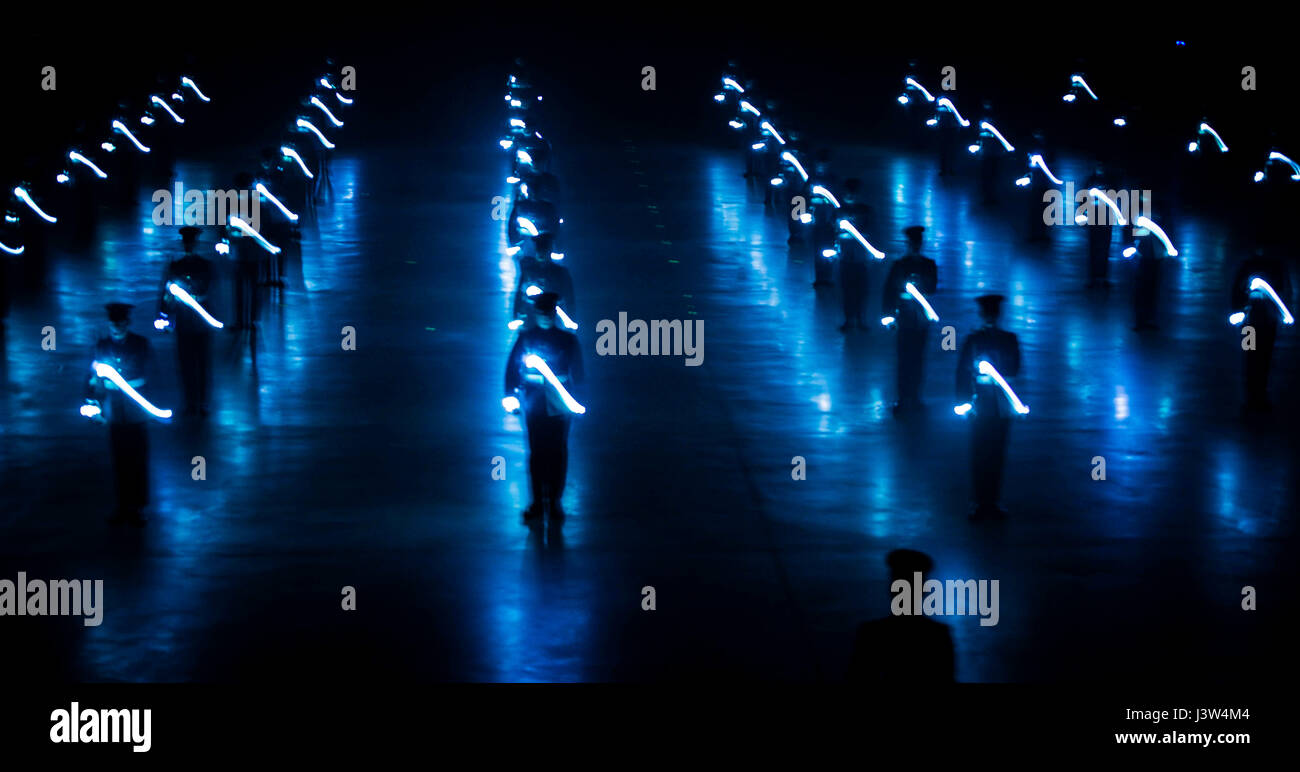 Airmen with the Queen's Color Squadron, 63rd Squadron Royal Air Force  Regiment, perform during the Virginia International Tattoo Finale at the  Scope Arena in Norfolk, Virginia, April 26, 2017. The Tattoo showcases