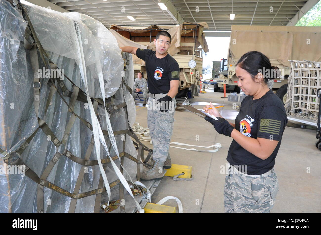 Reserve Citizen Airmen Tech. Sgt. Marlon Gibo, of Honolulu, Hawaii, and