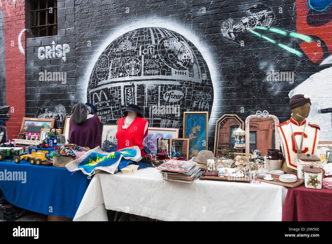 A sale of second hand items at a flea market on the Lower Eastside in New York City Stock Photo
