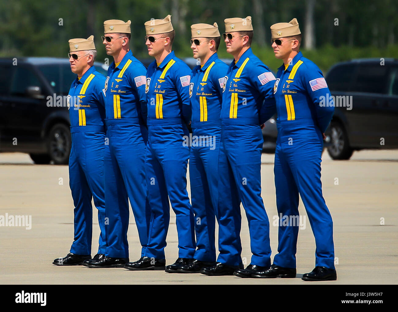 The pilots of the U.S. Navy Flight Demonstration Squadron, the Blue Angels,  stand ready to approach their aircraft prior to a flight demonstration  aboard Marine Corps Air Station Beaufort, April 28. The