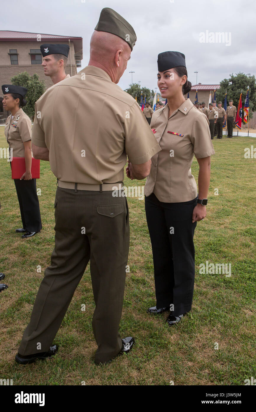 17U.S. Navy Seaman Nicole Beckman receives a Bluejacket of the Quarter