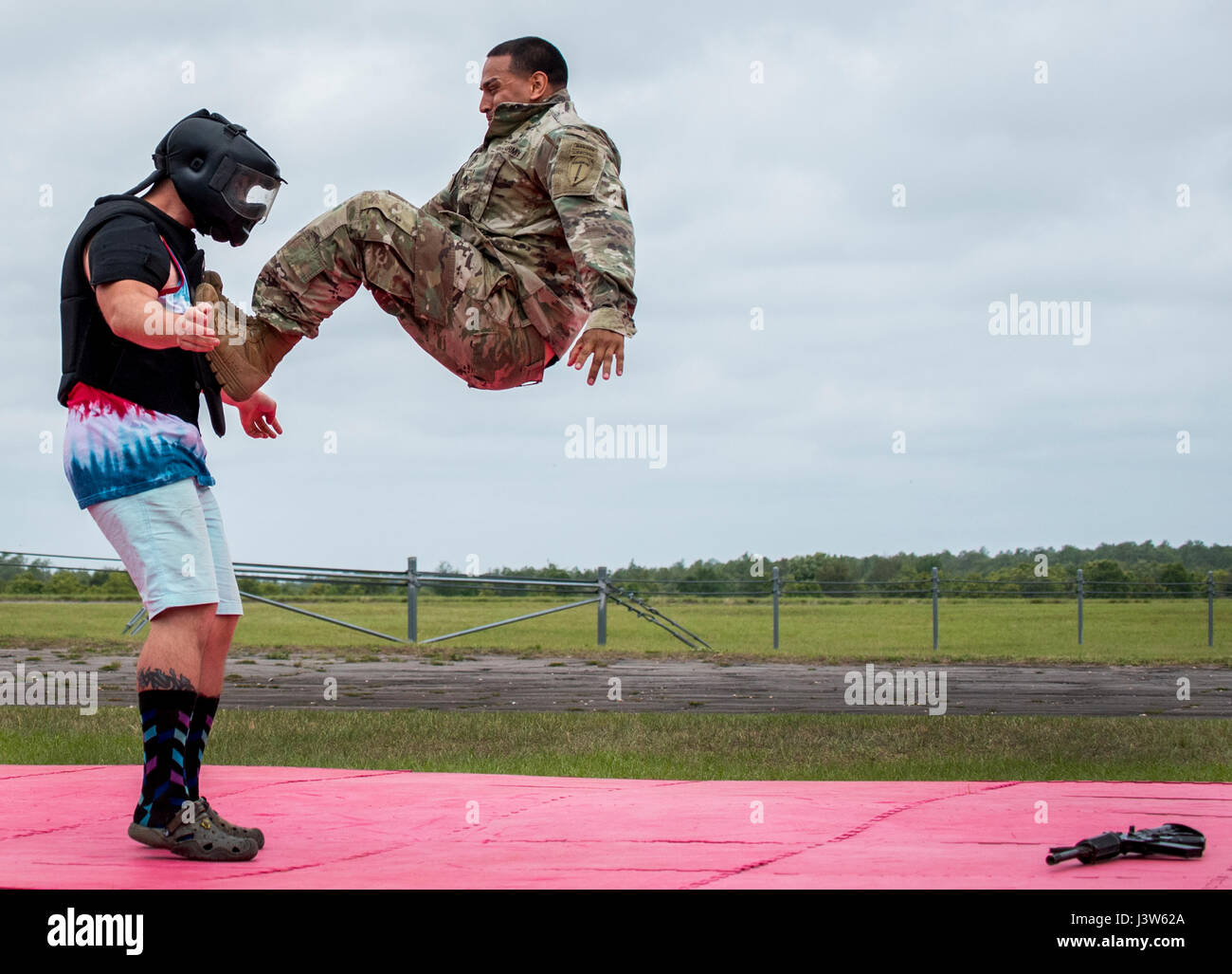 A Soldier demonstrates handtohand combat on a “volunteer” from the