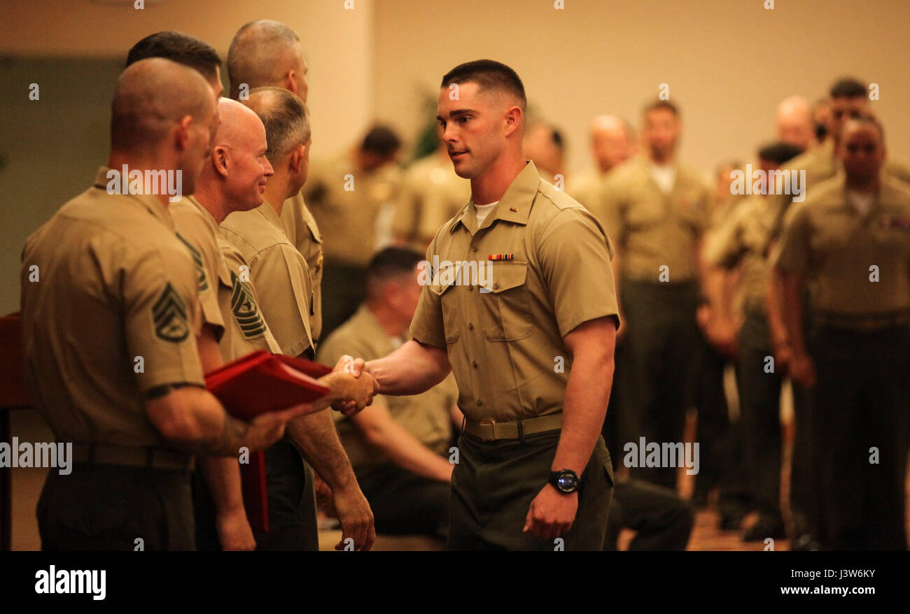 2nd Lt. Stephen Abernathy receives his Weapons and Tactics Instructor