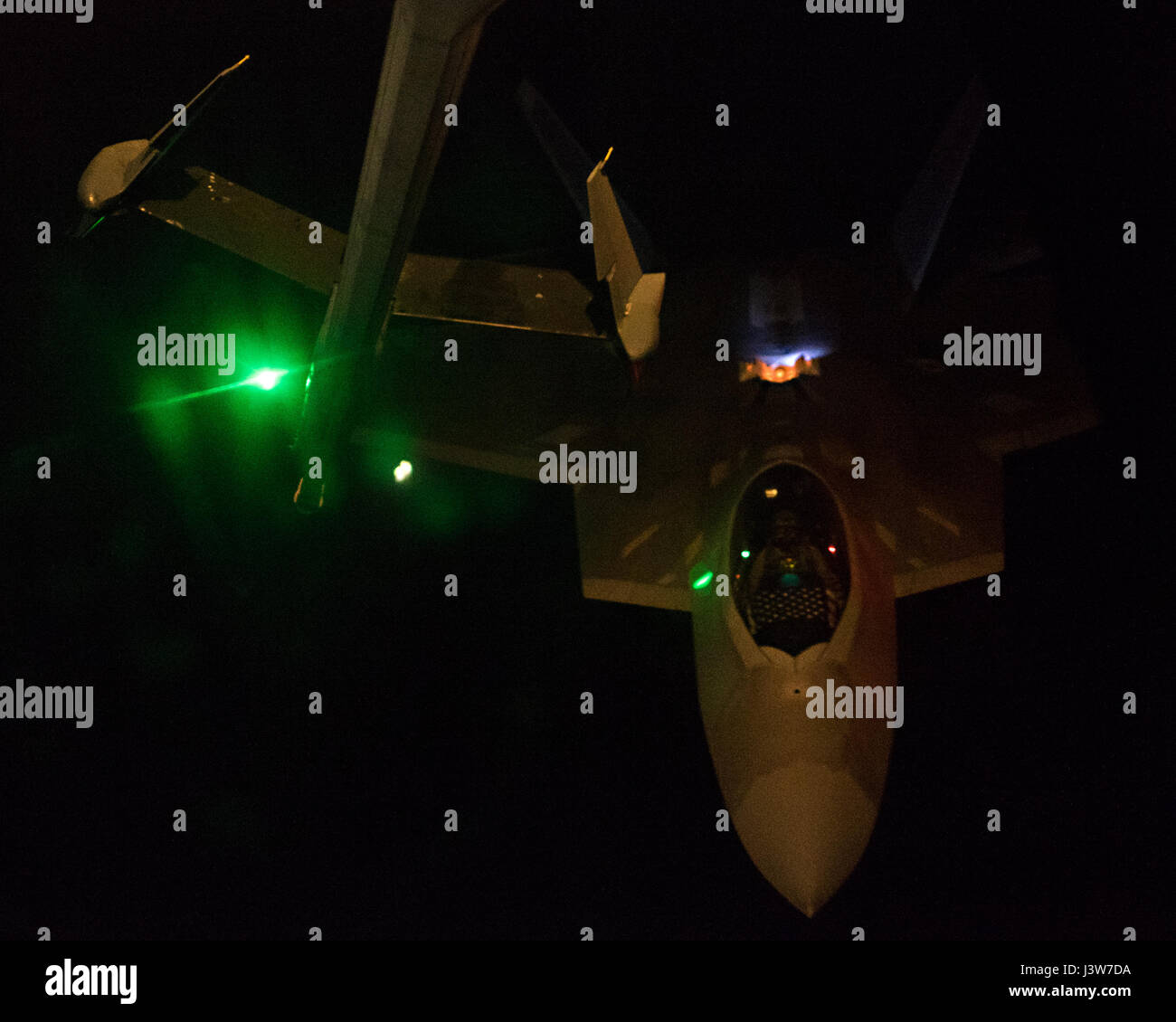 Lt. Col. Shell, 27th Fighter Squadron commander, pilots an F-22A Raptor ...