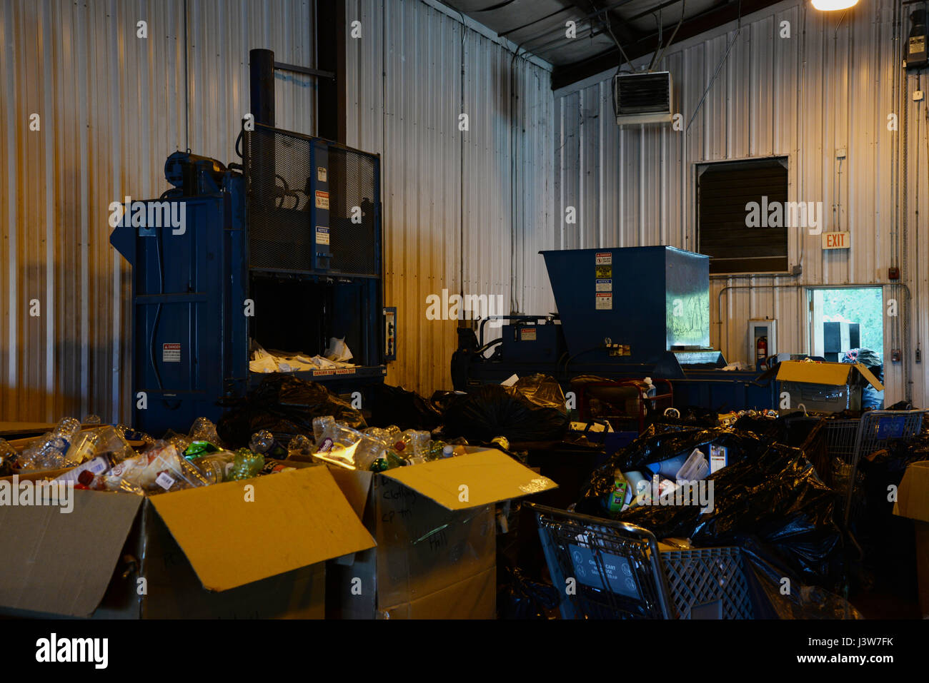 Multiple machines crush, shred and pack recyclables at the recycling center May 2, 2017, at
