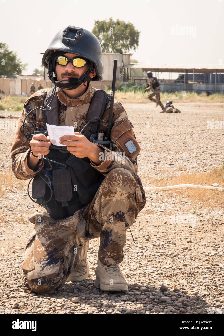 Baghdad An Iraqi special operations forces soldier provides radios
