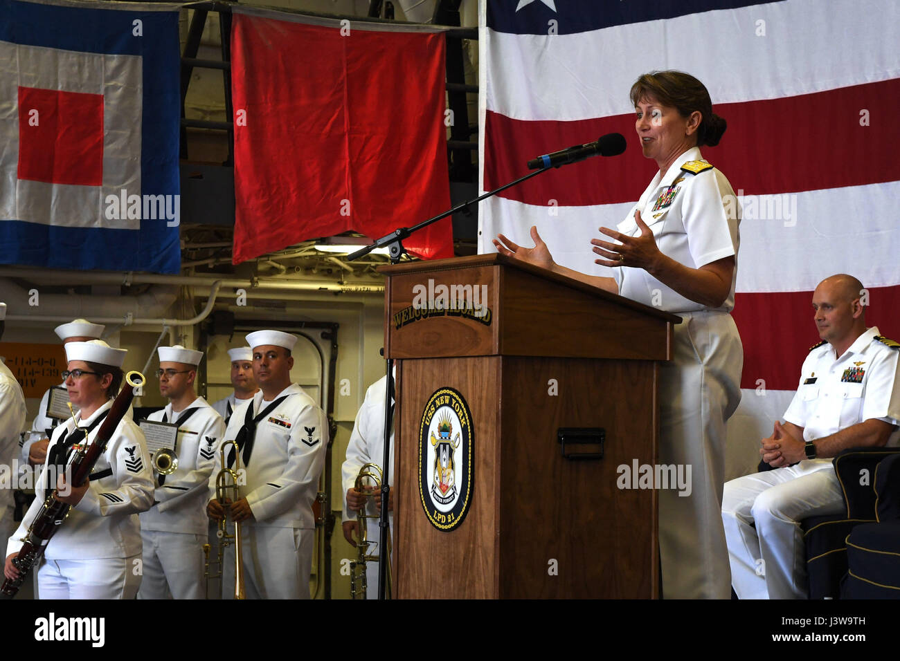 170505-N-ZN152-0048 PORT EVERGLADES, Fla. (May 5, 2017) Vice Adm. Jan Tighe, Deputy Chief of Naval Operations for Information Warfare/Director of Naval Intelligence, addresses the crowd aboard amphibious dock landing ship USS New York (LPD 21) during a fleet week gala featuring local dignitaries, distinguished guests, and military leaders held as part of the 27th annual Fleet Week Port Everglades. Fleet Week Port Everglades provides an opportunity for the citizens of South Florida to witness first-hand the latest capabilities of today’s maritime services, and gain a better understanding of how Stock Photo