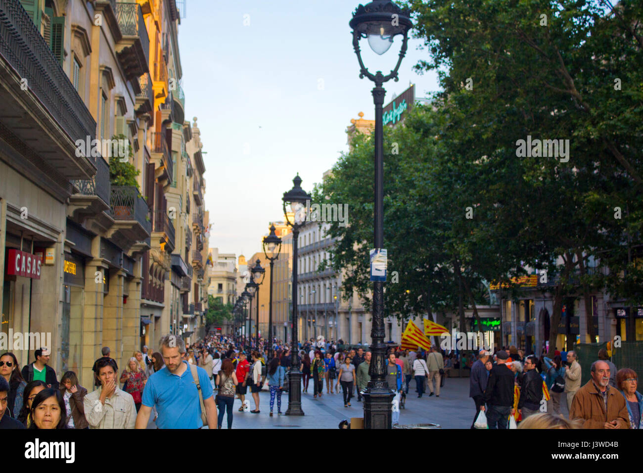 people walking in a street of Barcelona Stock Photo - Alamy