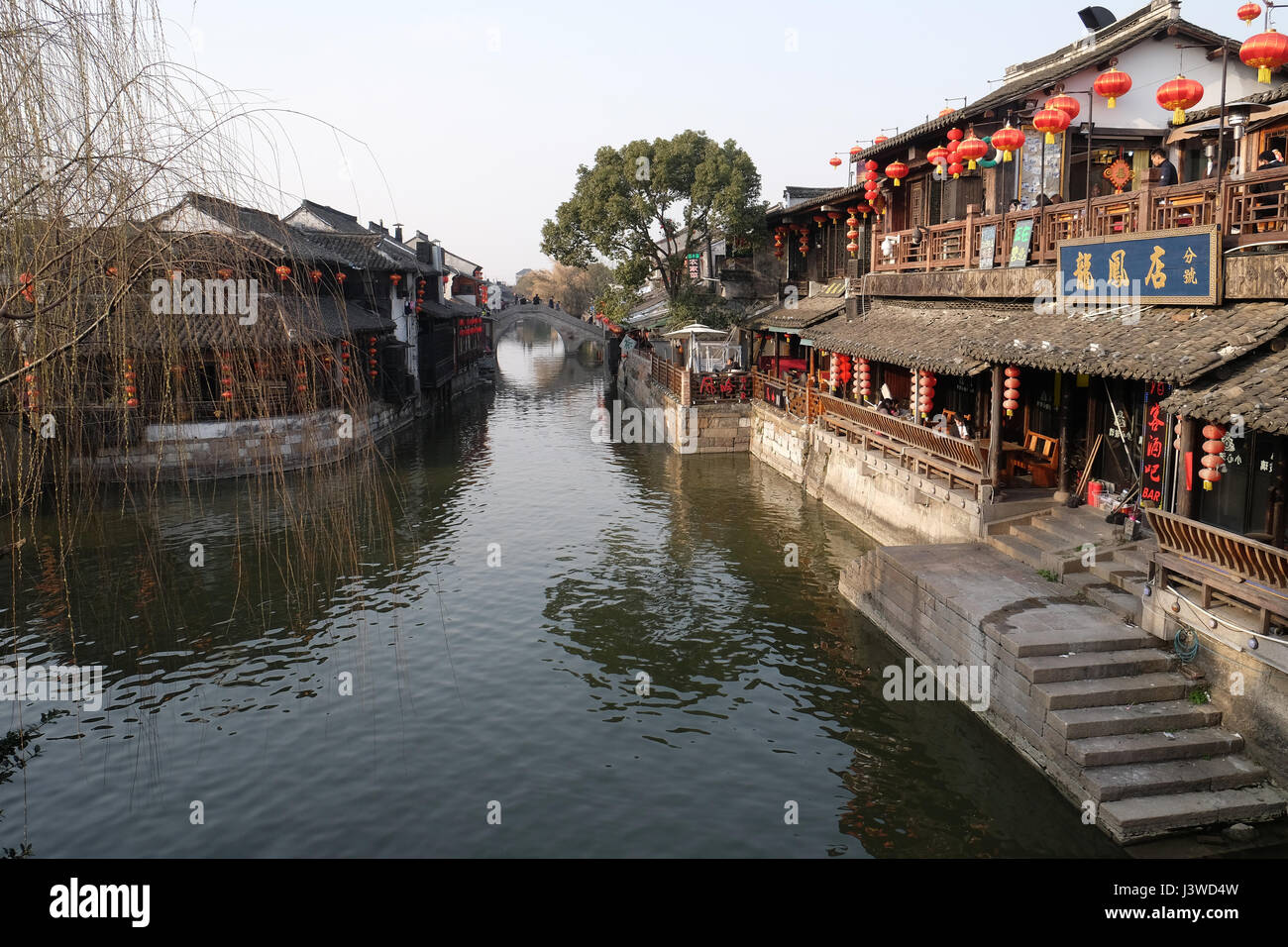 The Chinese architecture and buildings lining the water canals to Xitang town in Zhejiang Province, China, February 20, 2016. Stock Photo