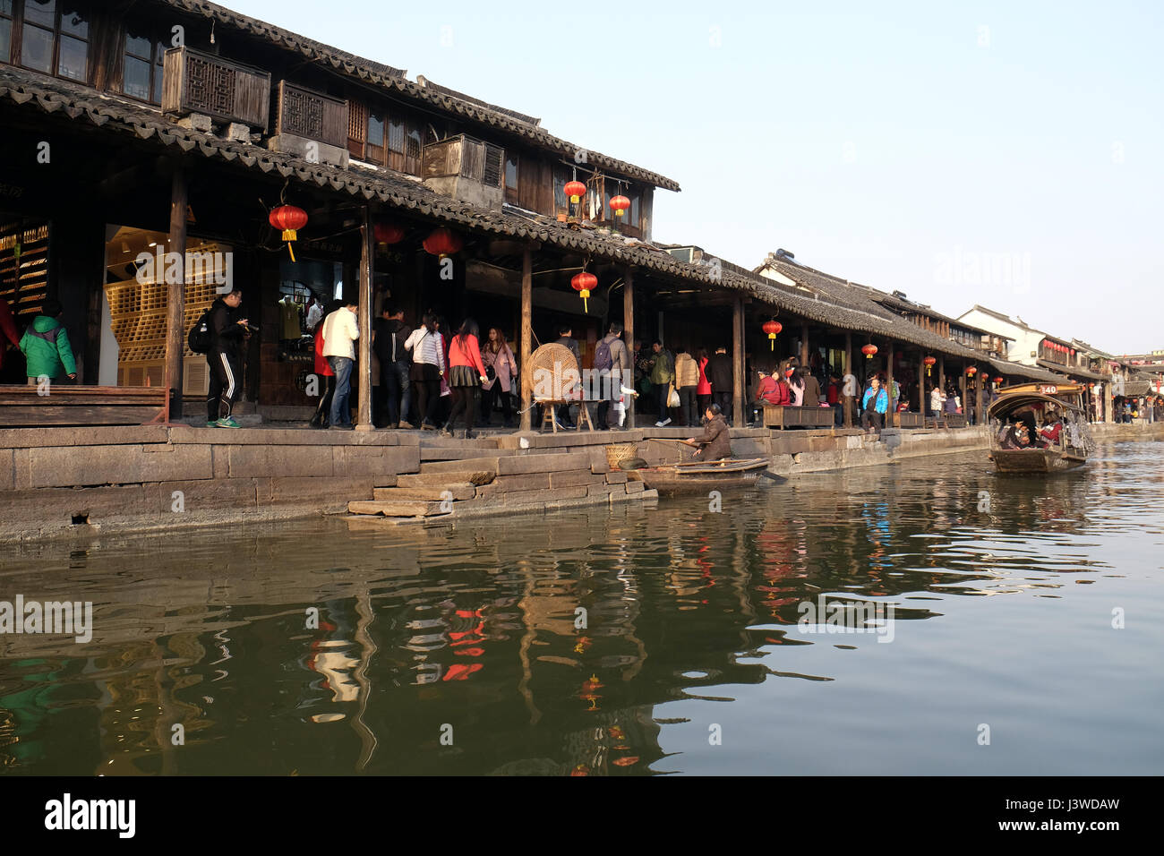 The Chinese architecture and buildings lining the water canals to Xitang town in Zhejiang Province, China, February 20, 2016. Stock Photo