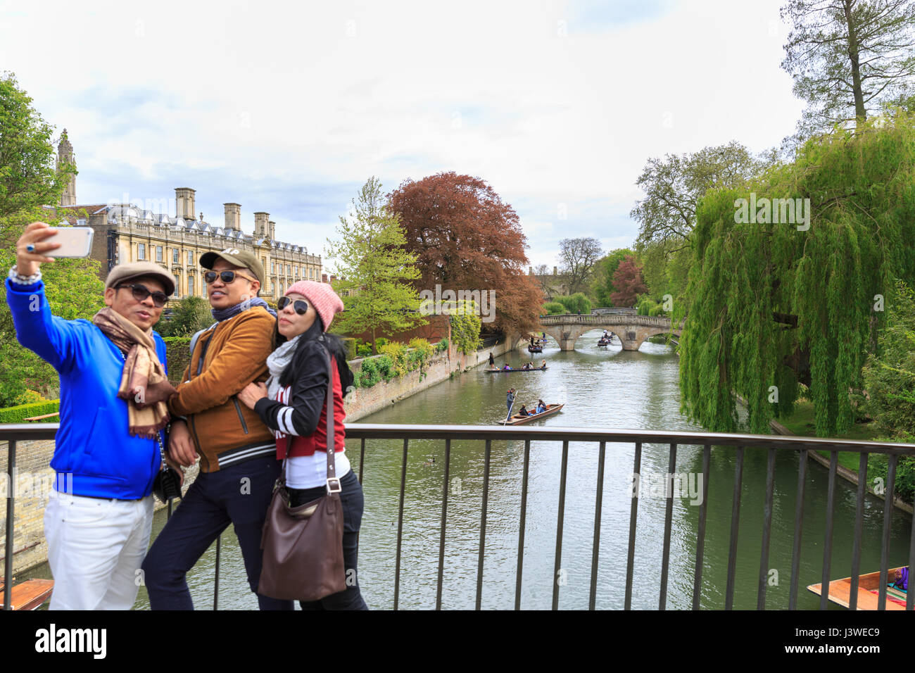 Tourist take selfies with punting on the River Cam in Cambridge, England, UK Stock Photo