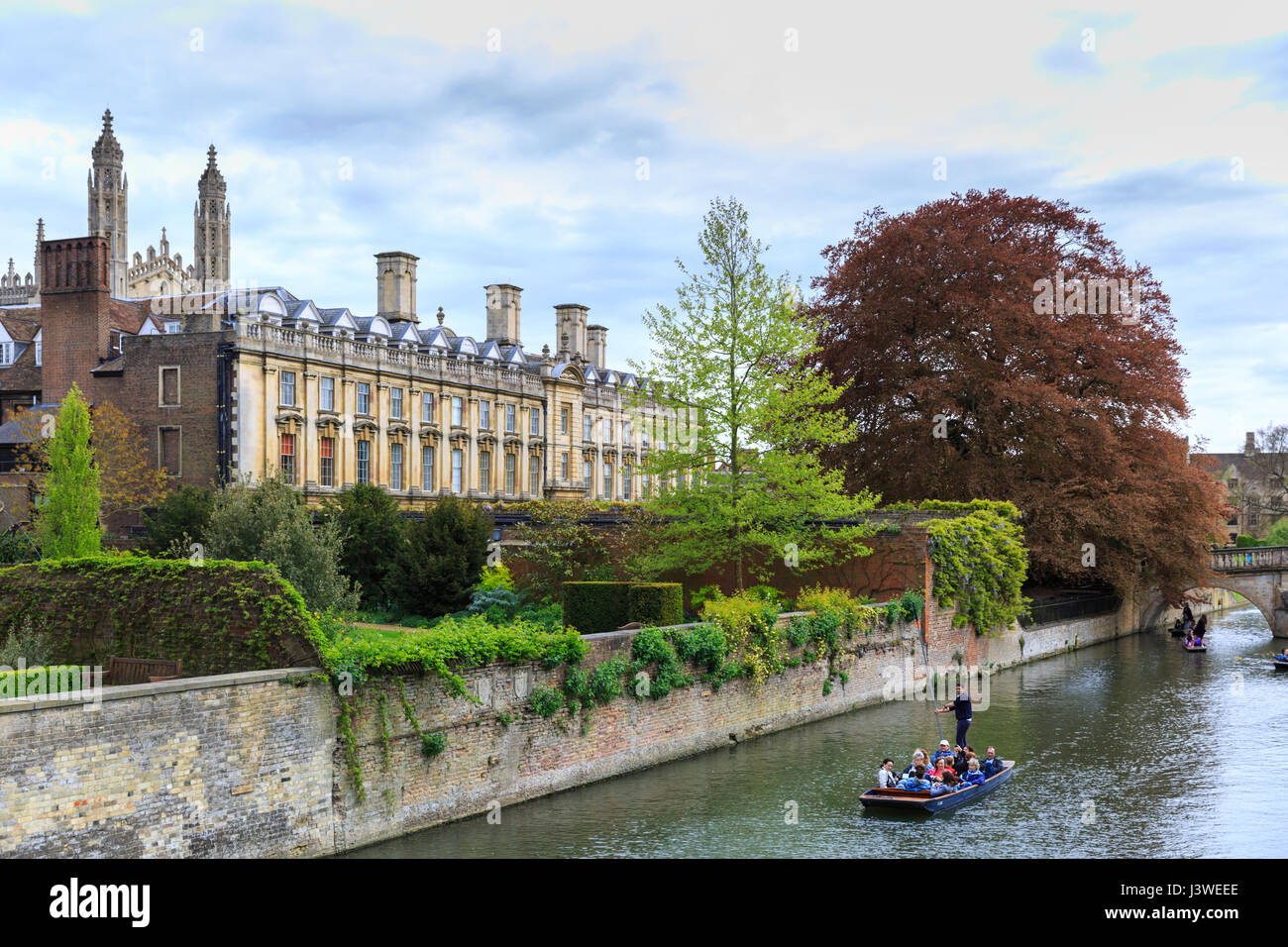 Punting on the Backs, River Cam at Clare College, Cambridge, England, UK Stock Photo