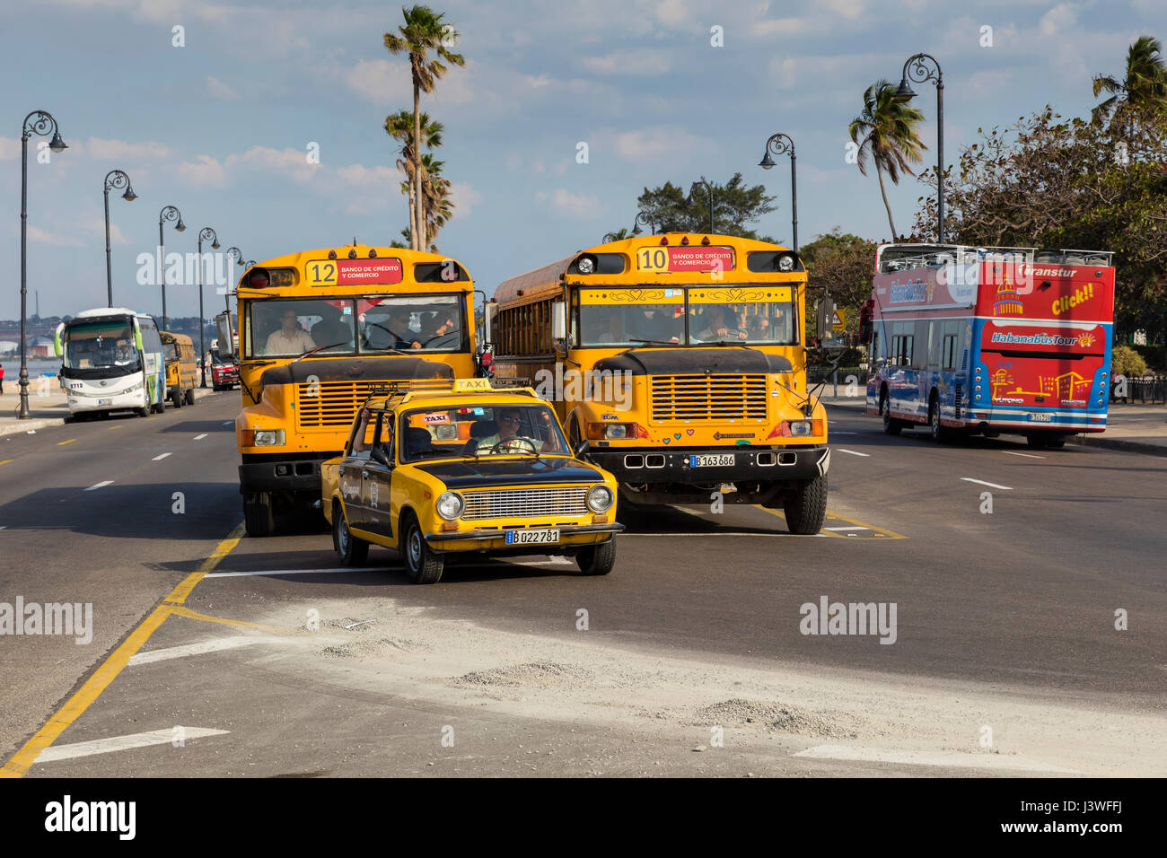 Yellow american old school buses Stock Photo